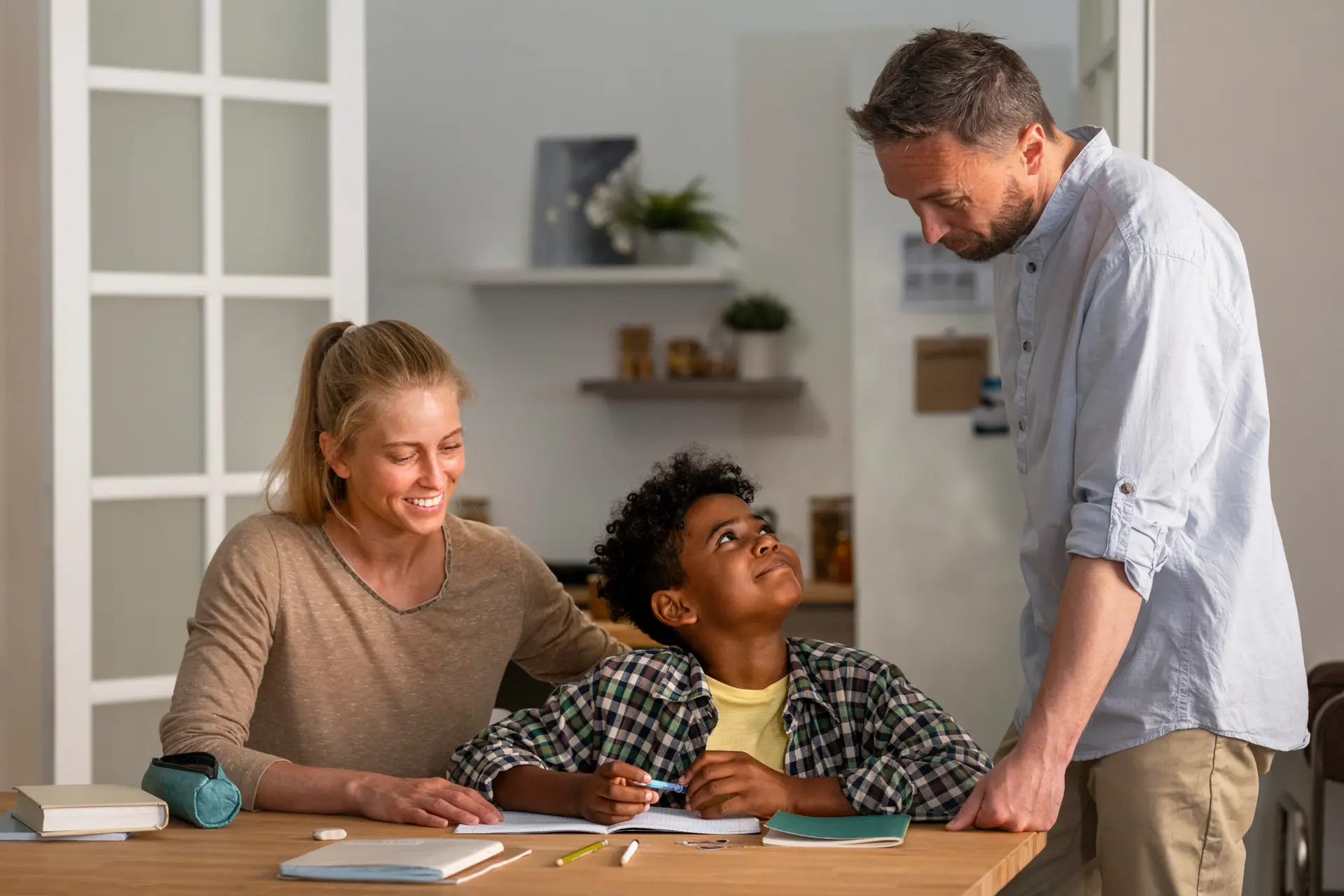 Mother explaining educational material to kid who has questions
